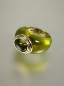 A  R L Christie of Edinburgh hand made gold mounted peridot green resin bombe ring set oval