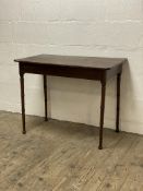 A George III mahogany console table, the rectangular top with rounded corners above a plain frieze