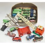A group of vintage toys to include motor vehicles, battleship, aeroplane, crane, comprising Dinky,