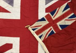 A large linen British union flag (h- 96cm, w- 140cm), together with a smaller nautical jack (h-