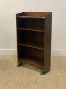 An early 20th century oak open bookcase fitted with two adjustable shelves. H100cm, W61cm, D20cm.
