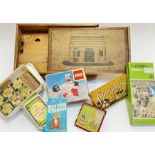 A quantity of vintage toys comprising a boxed wooden four horse stable to build, a boxed Subuteo