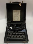 A 'Remington Noiseless Portable' typewriter in case, early 20th century. W32cm.
