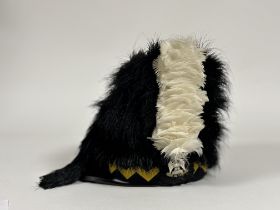 A Royal Scots Dragoon Guards popes feather bonnet. white, yellow and blue chevron, head barrel white