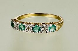 A 9ct gold four stone emerald and three stone diamond set ring the emeralds approximately 0.1ct N