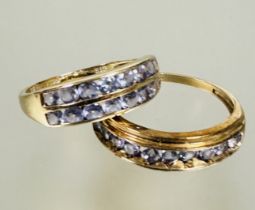 A 9ct gold double channel set lavender gem set ring N and a 9ct gold channel set ten lavender gem