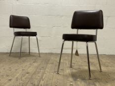 A pair of 1970's tubular chrome and faux leather upholstered chairs. H86cm.