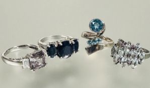 A group of four silver gem set dress rings O/N `8.9g (4)