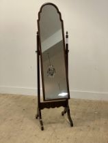 A Queen Ann style mahogany cheval mirror on tapered side supports with acorn finials. H157cm.