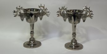 A pair of Kenneth Turner nickel plated twin stag head candle holders. (h-29.5cm) (marked verso) (2)