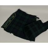 A Gents kilt and matching trousers together with black watch kilt (rosettes to vertical hem) and