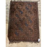 An antique  Bokhara red ground rug decorated with two rows of gulls.