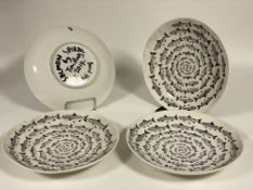 Tom Rooth, a set of four contemporary 'salmon Spiral' studio pottery plates, marked verso. D37cm.