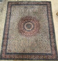 An early 20th century machine loomed Persian style carpet, with circular medallion on a busy field
