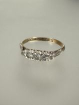 A 9ct gold white stone graduated ring set in platinum N 1.78g