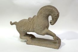 A 20thc pottery figure of a Tang standing horse. (h-33cm l-48cm)