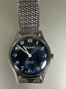 A vintage Gents Swiss Gigandet manual wind stainless steel wrist watch with blue dial and luminous