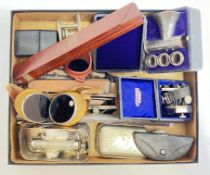 A group of vintage tools and medical equipment including syringes, goggles, Clinitest urine sugar