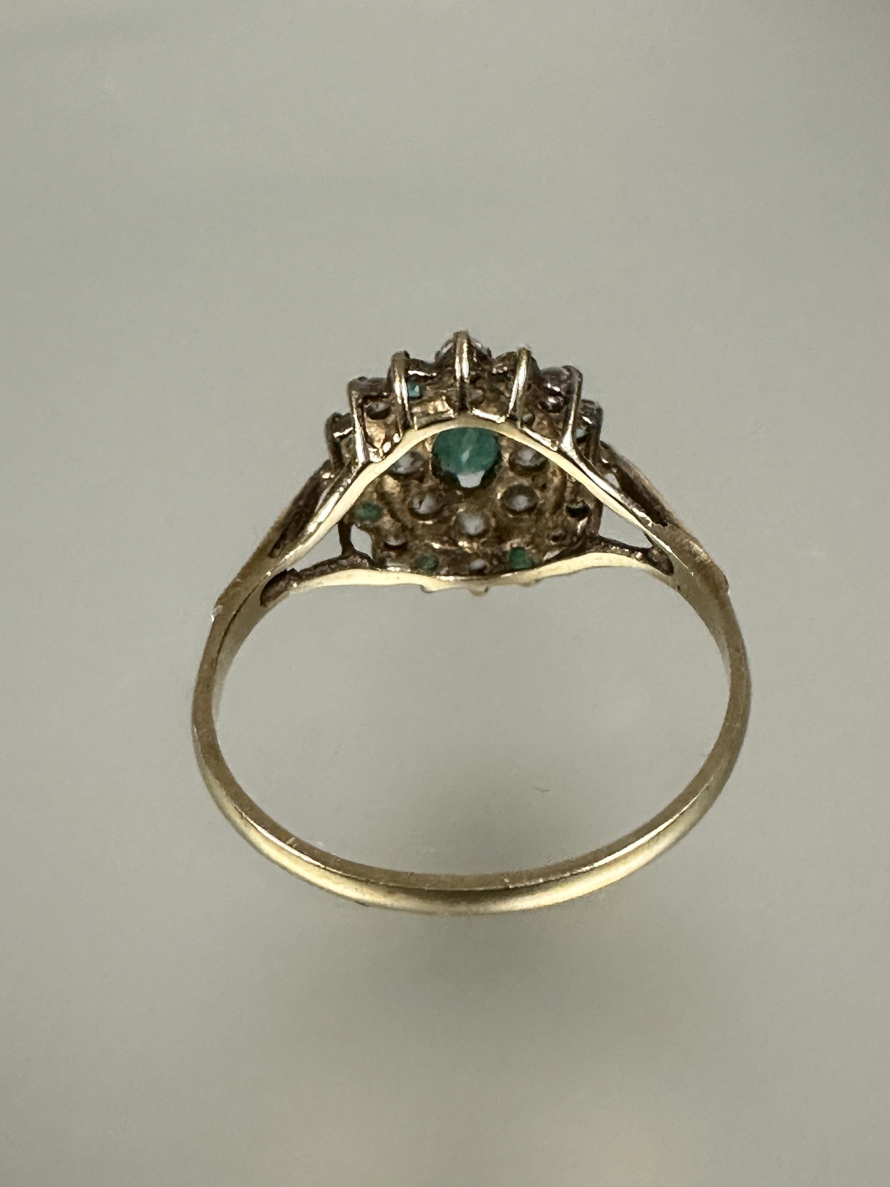 A 9ct gold emerald and cz cluster ring with oval central emerald and outer border of eight - Image 3 of 3