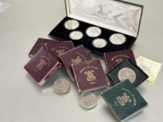 A collection of seven Festival of Britain 1951 crowns in original boxes, and a boxed mint set of