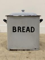 A mid 20th century enamelled tin breadbin with handle to each end. H40cm.