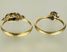 A 9ct gold blue oval zircon approximately 0.7ct  mounted in four claw setting flanked by three