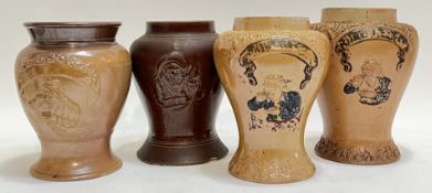 A group of four salt glazed baluster form snuff jars each with moulded decoration depicting a