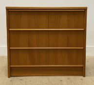 A mid century style teak veneered chest fitted with three drawers. H72cm,  W81cm, D46cm.
