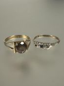 A 9ct gold dress ring set circular cut cairngorm mounted in four claw setting T 2.11g and a 9ct gold