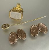 A pair of 9ct gold oval sleeve links with engraved letter J, L x1.7cm   3.6g , a gilt seal with
