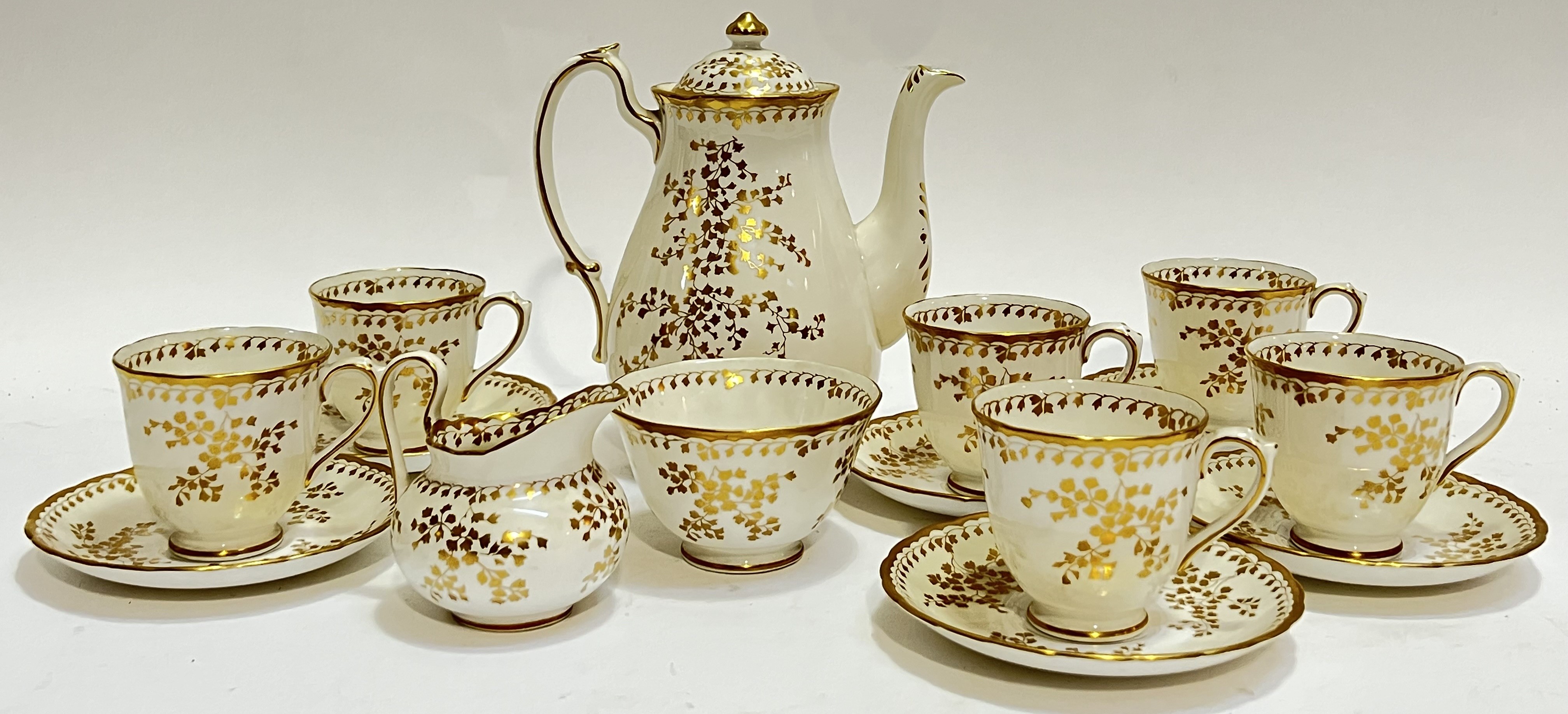 A New Chelsea china part tea or coffee set with gilt foliate decoration, comprising a pot (h-