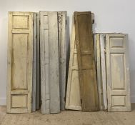 A group of 10 painted and panelled pine window shutters, late 19th / early 20th century. (10)