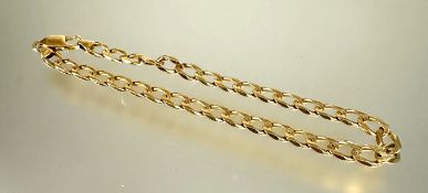 A 18ct gold flat kerb link bracelet with lobster claw fastening 22cm 12.85g