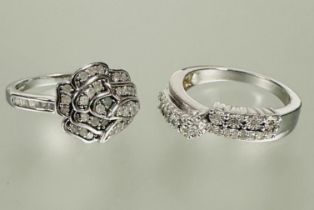A silver diamond set floral style cluster ring O and a silver diamond set a central diamond point