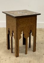 A Middle Eastern / North African occasional table, early 20th century, the square top raised on