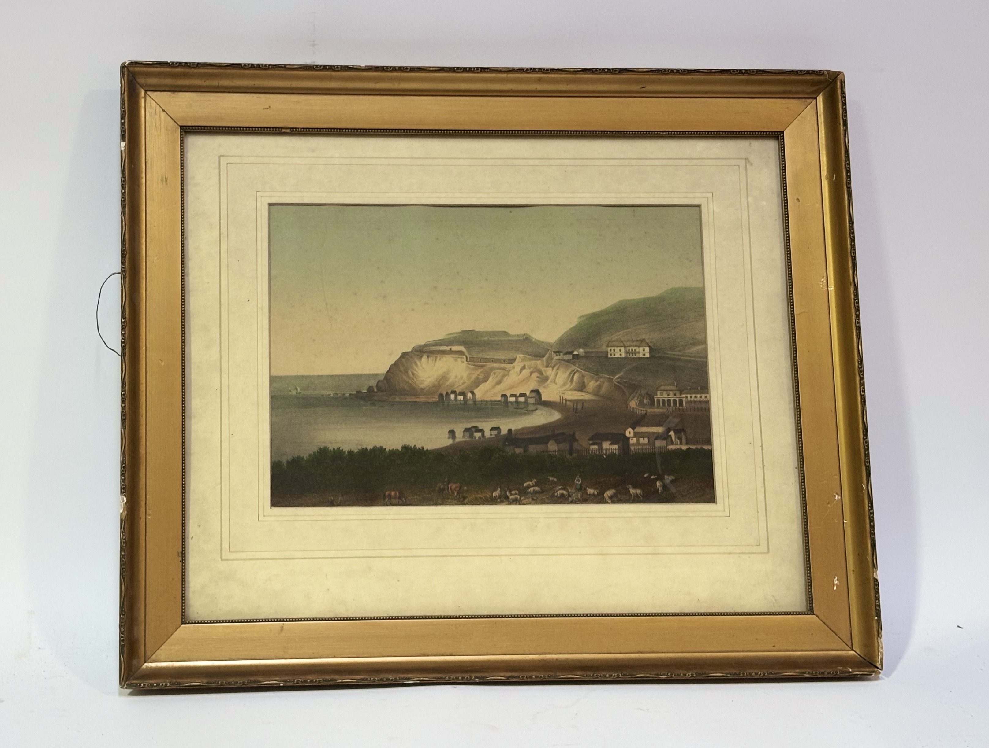 A framed 19thc coloured engraving of, Freshwater Bay, Isle of Wight. (22cmx32cm) (signs of foxing)