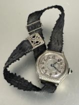 A ladys vintage Blancpain ladys rolled gold wristwatch with silvered dial and arabic numerals with