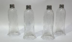 A set of four Baccarat etched tulip shaped hurricanes with scalloped edges. (h-29cm) (all marked) (