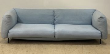 A large contemporary Italian sofa by Seven Salotti, blue linen upholstered on a metal frame.