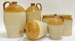 A group of treacle glazed stoneware comprising two large bottles/jars (largest h- 34cm), two smaller