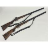 A pair of reproduction 19thc single barrelled muzzled loading rifles with percussion lock, steel