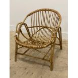 A 1970's boho style bamboo armchair. H68cm, W64cm.