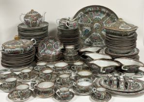 An extensive Canton famille rose porcelain assembled dinner service, largely 20th century, in a