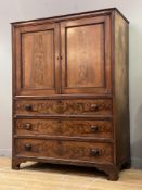 A mid-19th century well-figured mahogany linen press of small proportions, the cross-banded and
