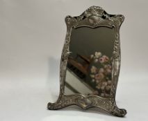 An American sterling silver table or easel mirror, Dominick & Haff, New York, early 20th century, in