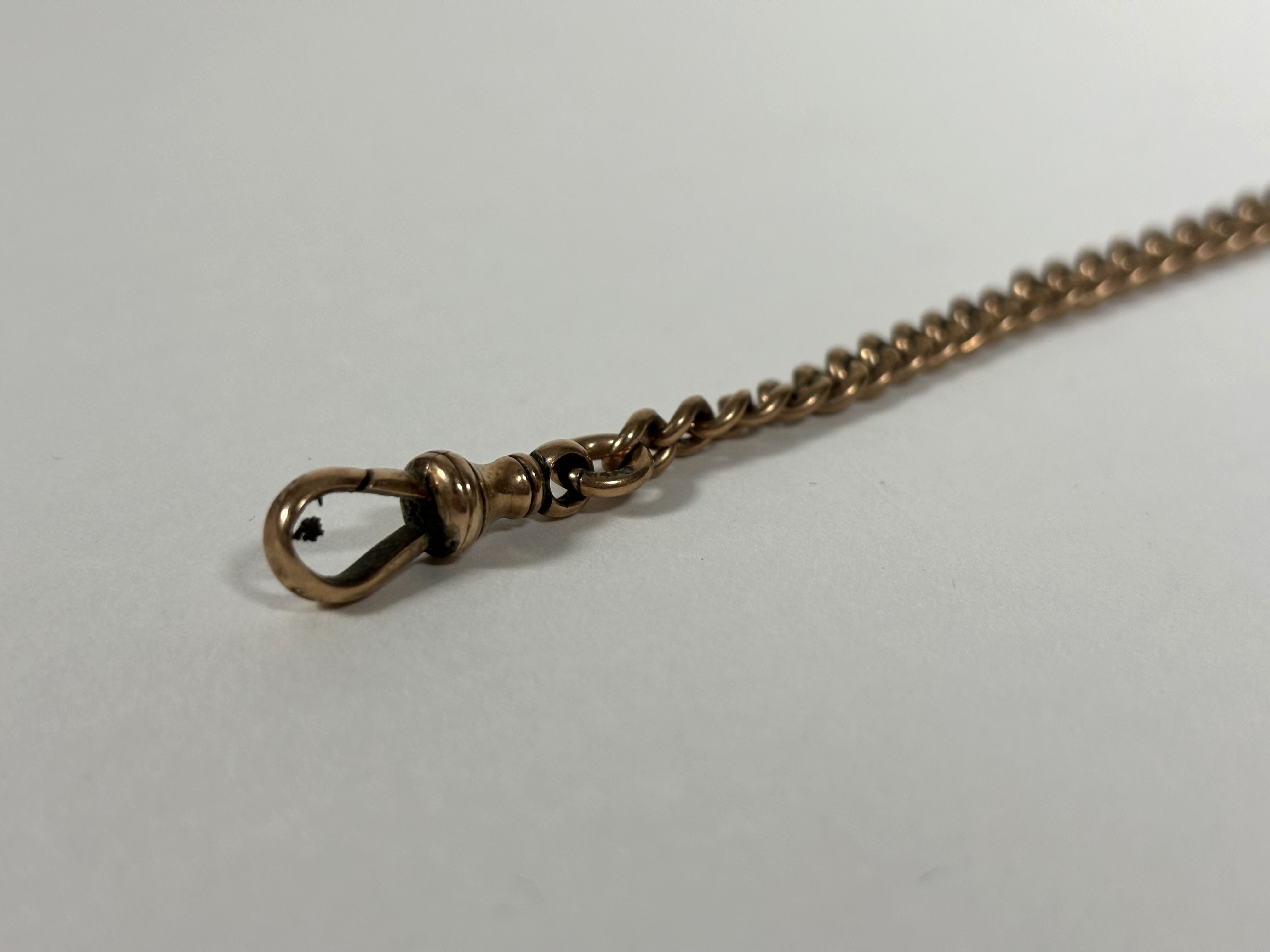 A 9ct gold curblink Albert watch chain, with T-bar, the chain stamped "375", the T-bar "9c". - Image 3 of 3