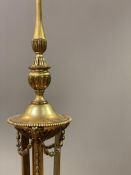 An early 20th century gilt-brass lamp standard in the Neoclassical taste, three branches issuing