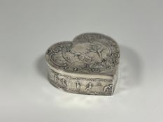 A large late Victorian silver heart-shaped dressing table box, import marks for John George Smith,