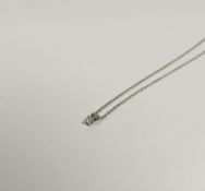 A solitaire diamond pendant