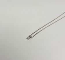 A solitaire diamond pendant